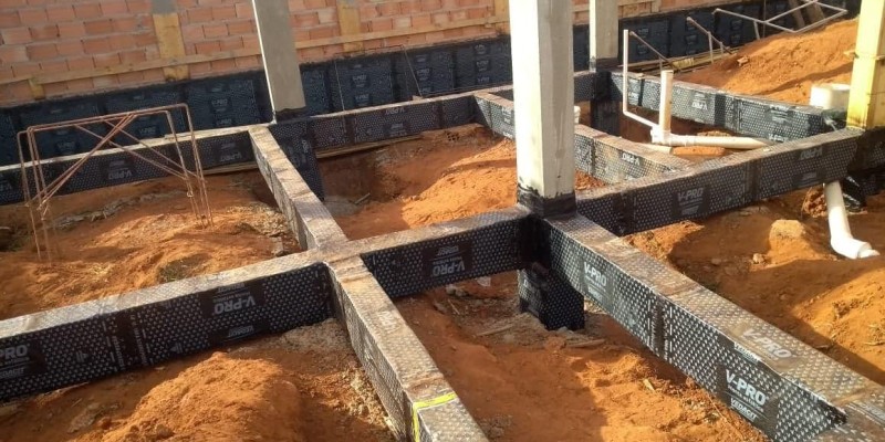 Impermeabilização de Baldrames, com manta asfáltica e cristalização.