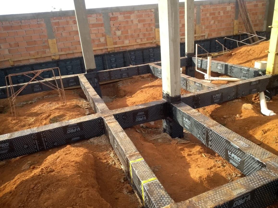 Impermeabilização de Baldrames, com manta asfáltica e cristalização.